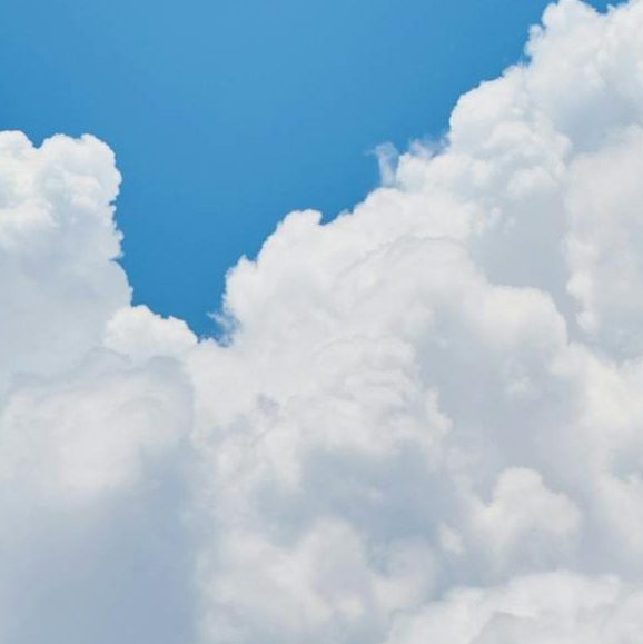 blue sky with fluffy white clouds